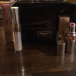 1 lipstick 1 lip gloss 1 black make up bag